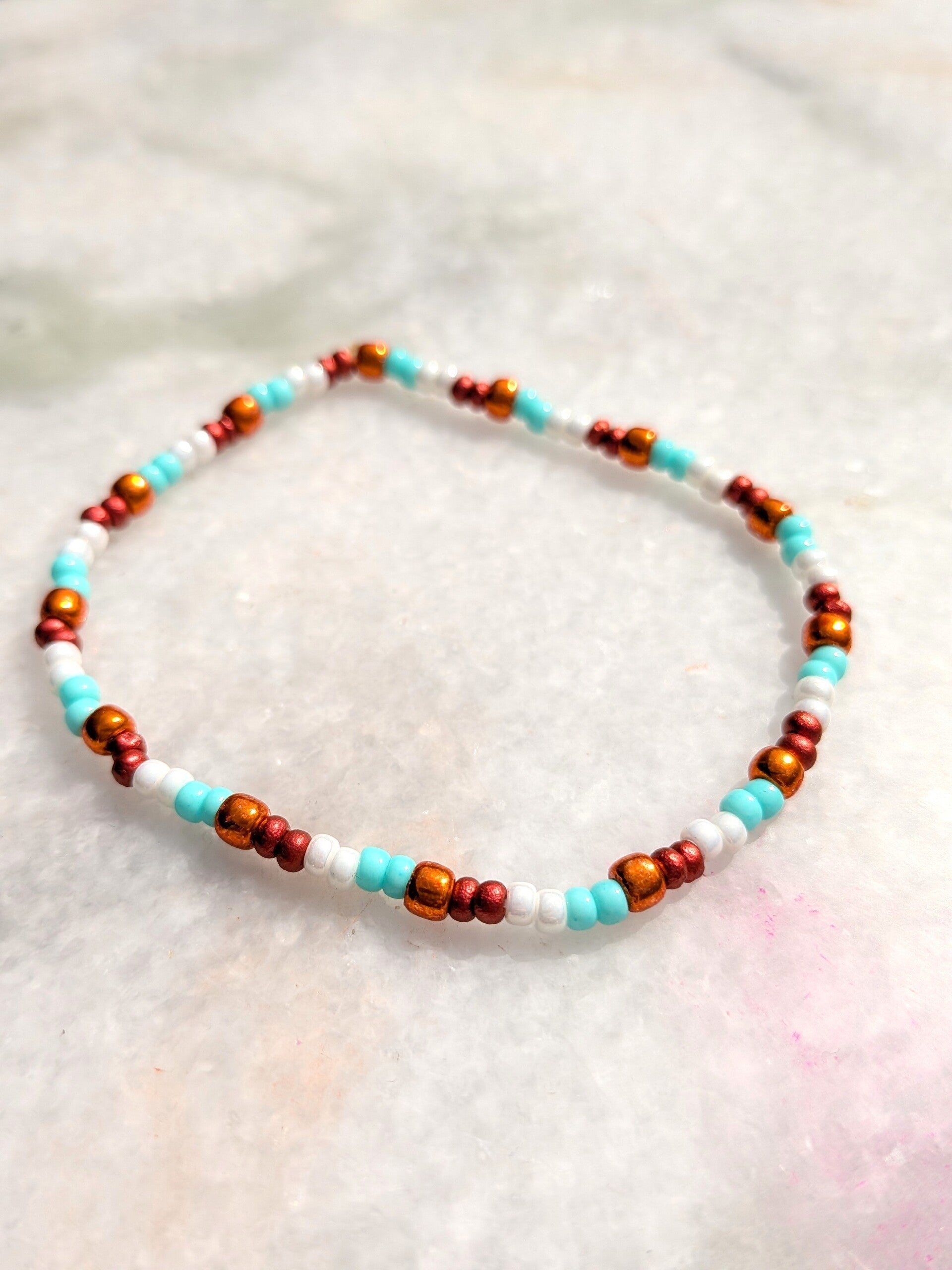 Armband rood/wit/blauw/oranje