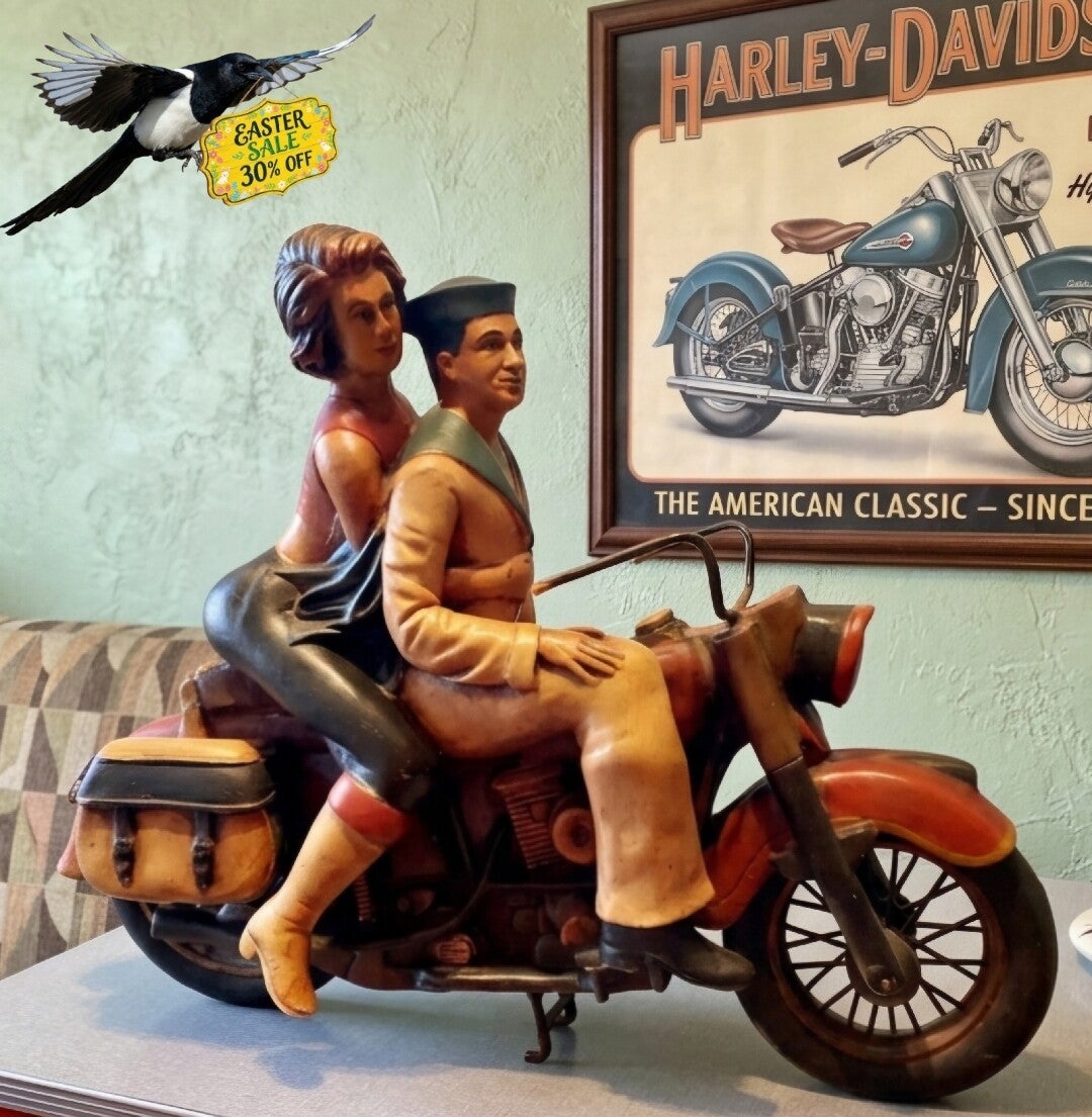 Past Times sailor on Harley Davidson sculpture