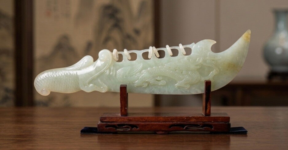 30 - 50 Year Old Carved 6 Ring Jade Dragon