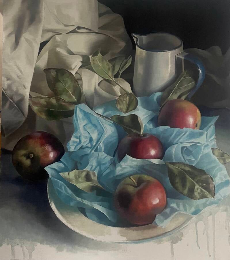 Apples with blue tissue paper