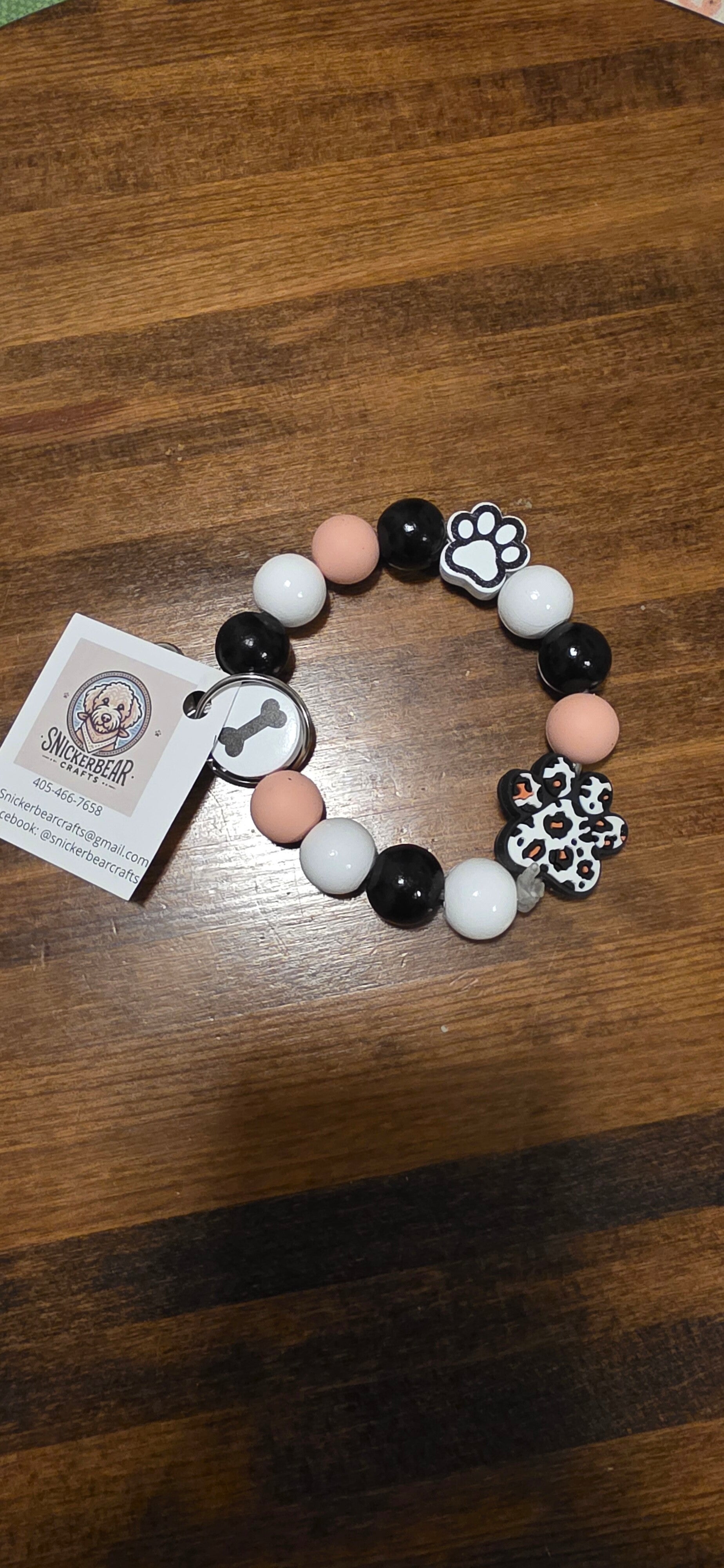 Leopard pawprint wristlet