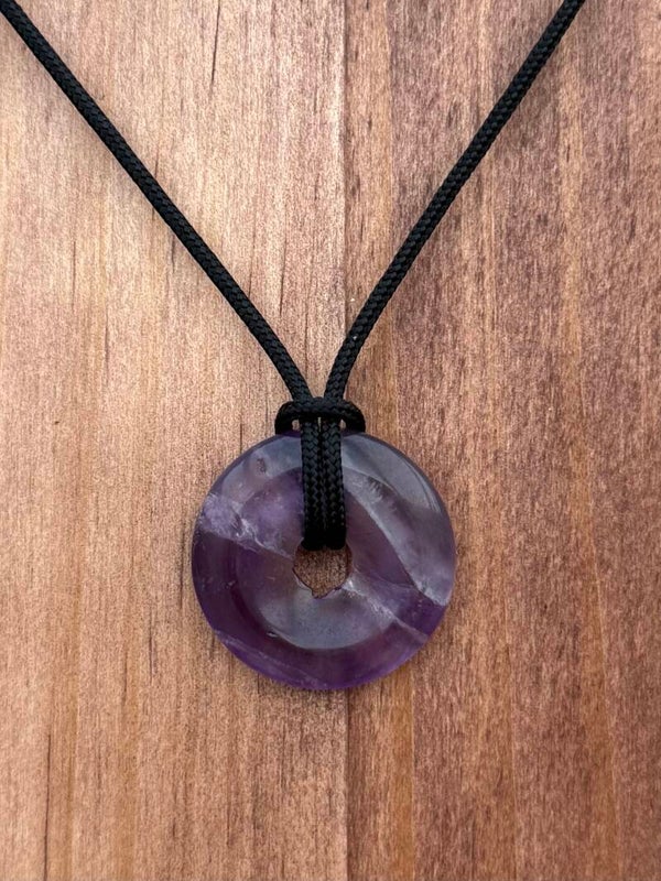 Amethist donut hanger met kleine schade