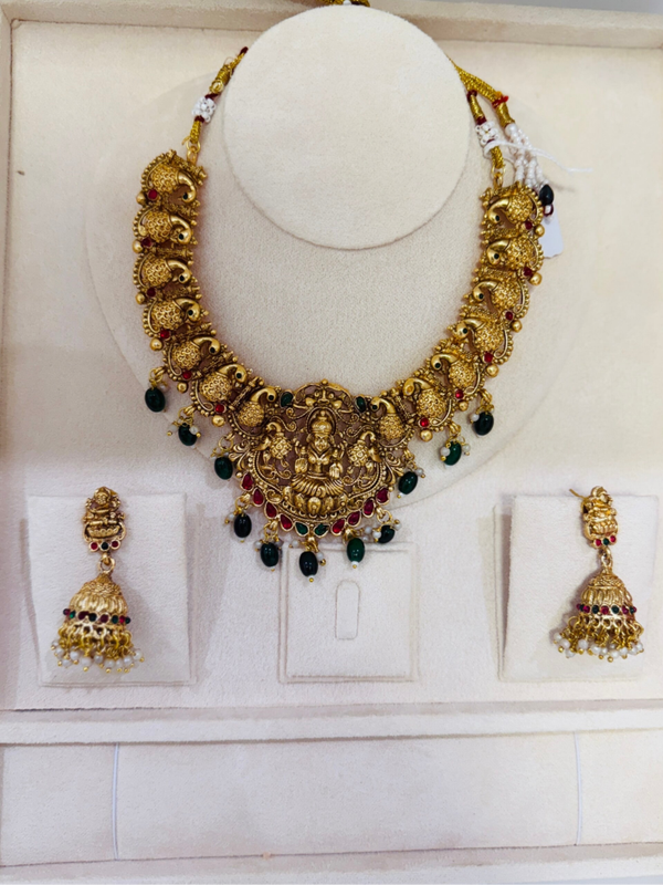 Temple traditional style necklace with green and red little beads