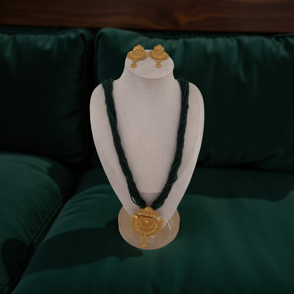 Green Potey with gold plated pendent