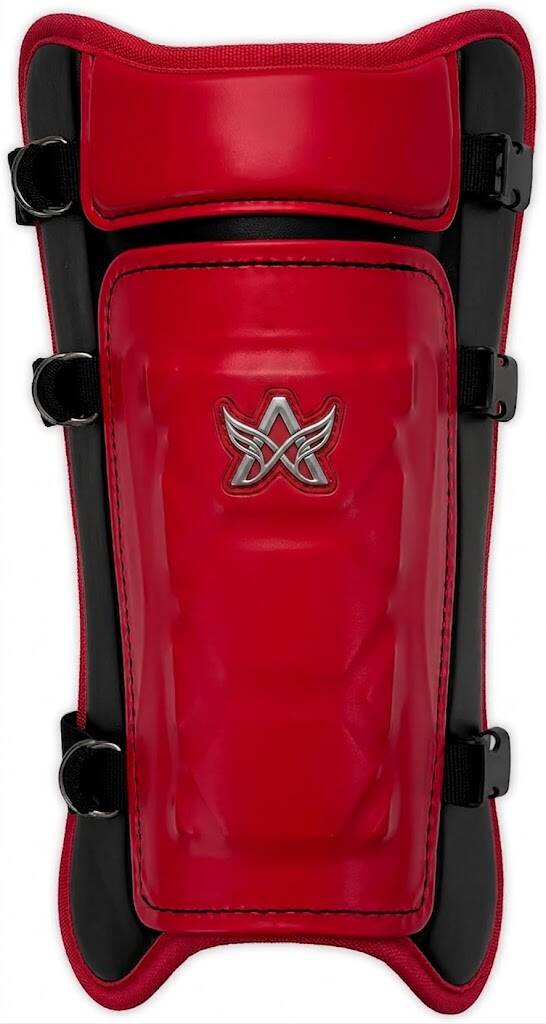 A red and black baseball shin guard with an embossed silver wing logo on a white background.