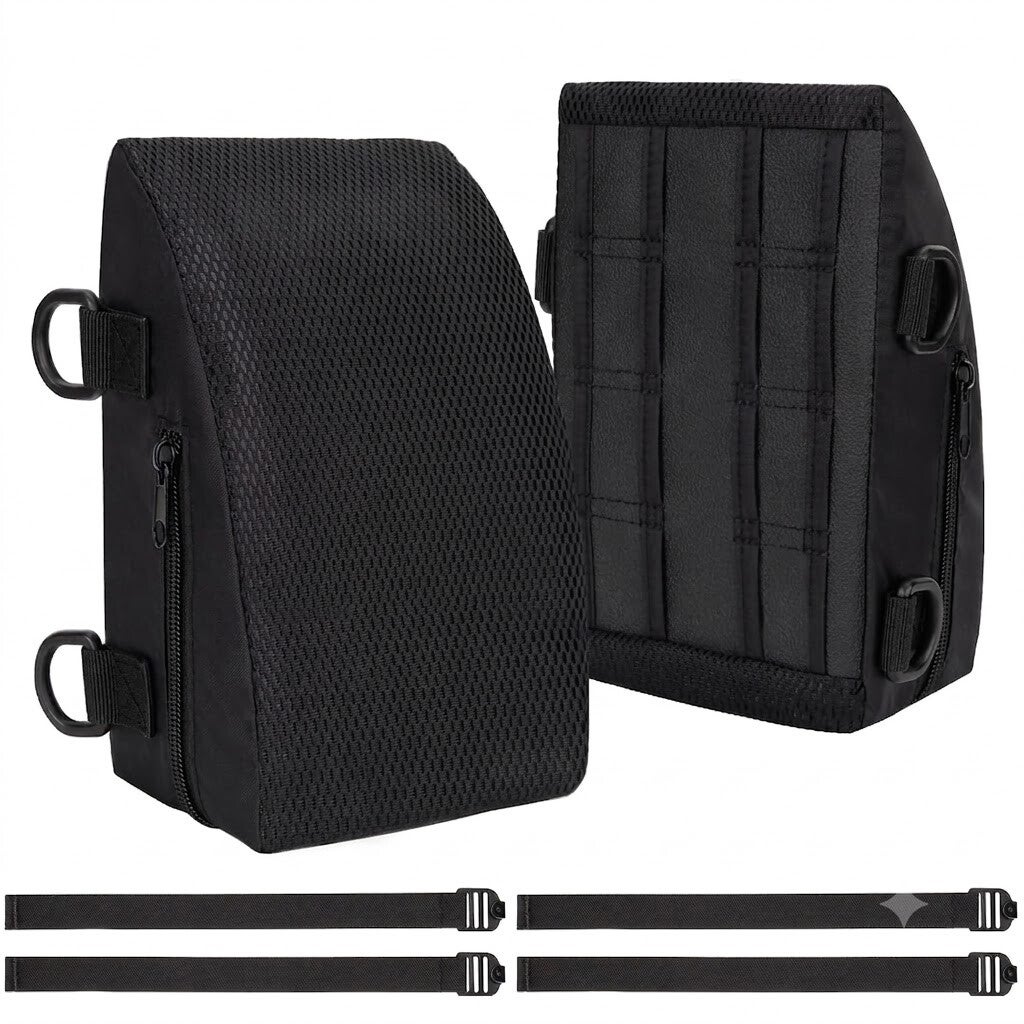 Leg guard pair in black, wedge-shaped with zippered mesh panels and extra straps, on a white background.