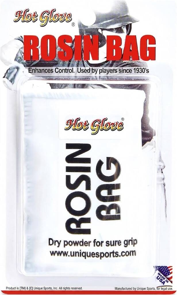Hot Glove rosin bag for baseball pitchers, white dry powder grip bag in retail blister packaging.