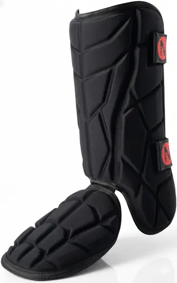 Norespnea Batter's Leg Guard displayed showing its pre-formed shell construction and accessible protective design.