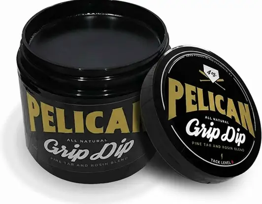 Pelican Bat Wax Pine Tar Baseball Bat Grip and Rosin Blend displayed showing its blended pine tar and rosin construction and 4-ounce comprehensive grip design.