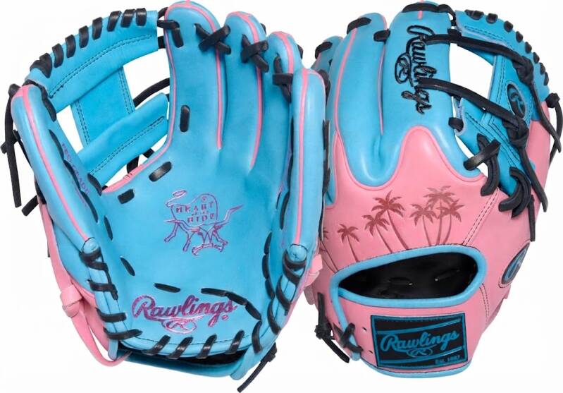 Rawlings Heart of the Hide ColorSync baseball glove in baby blue and pink with palm tree embossing and black lacing.