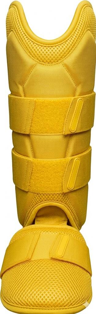 A yellow baseball leg guard with mesh fabric and adjustable straps.
