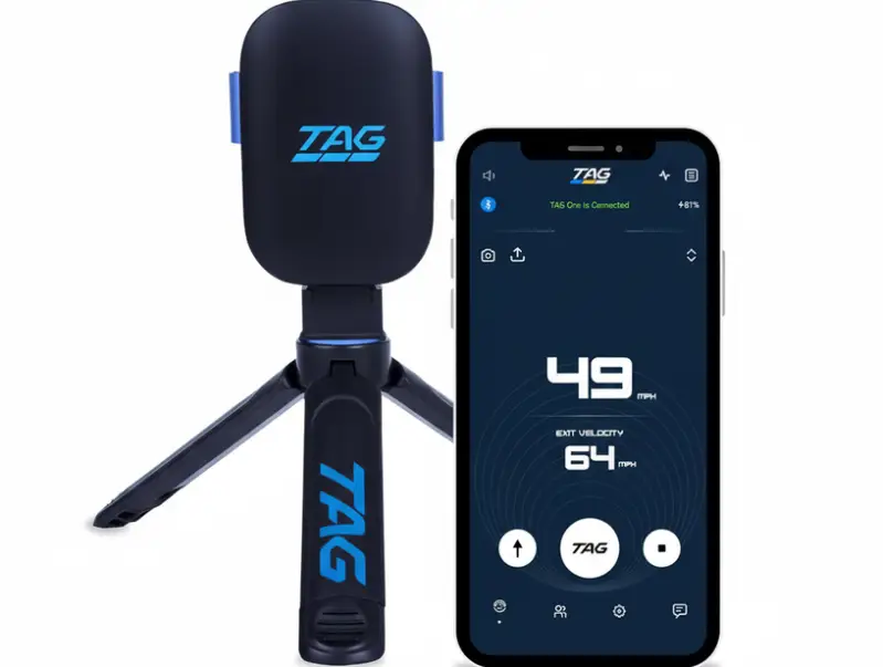 TAG ONE Sports Radar Gun displayed showing its digital velocity display and ergonomic grip with rechargeable battery design.