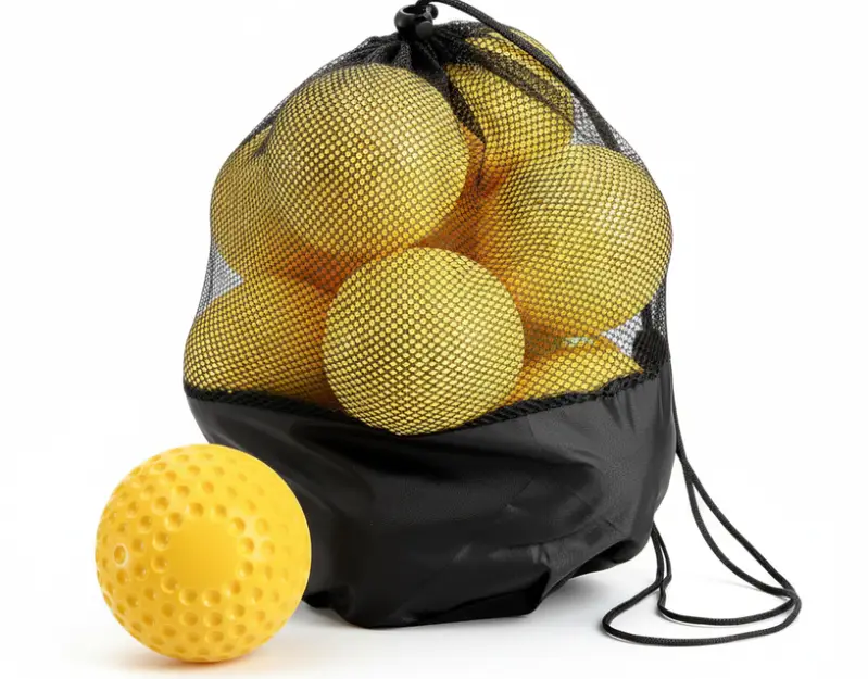 Tebery 12 Pack Yellow Dimpled Practice Balls displayed showing their high-visibility yellow dimpled construction and pitching machine softball design.