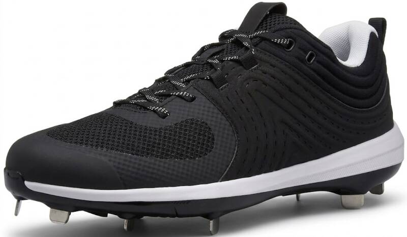 A black softball cleat with a white midsole and heel interior featuring metal spikes and patterned laces.