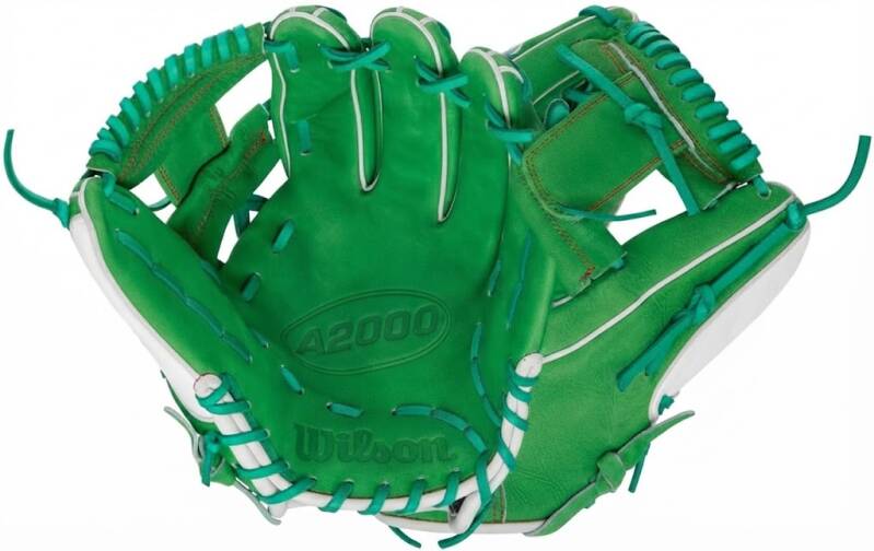 Wilson Baseball glove, A2000 1786 Shriners edition, in green leather with teal laces on a white background.