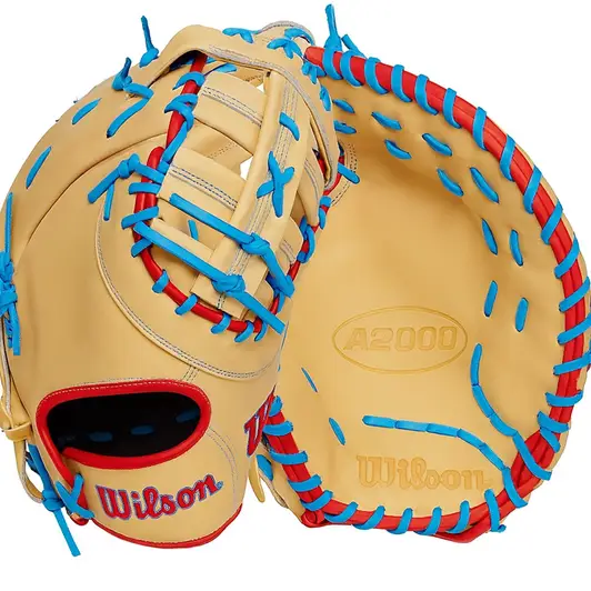 Wilson Spring 2025 A2000 first base mitt in camel leather with blue and red lacing, Pro Stock leather construction and deep pocket for competitive high school and adult players.