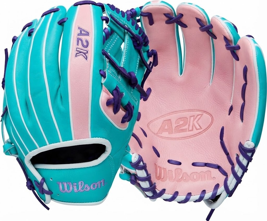 Wilson Winter 2025 A2K baseball glove in teal and pink colorway with purple lacing and premium leather construction.