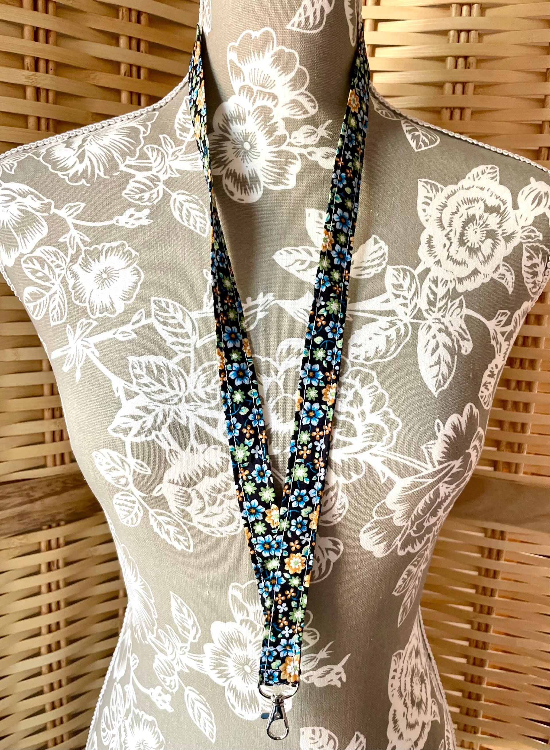 Tour de cou porte clés/ badge imprimé fleuri noir vert et jaune