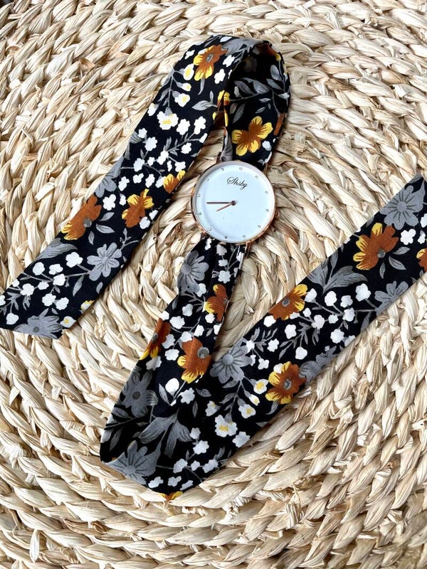 Montre à nouer bracelet fleuri noir et camel