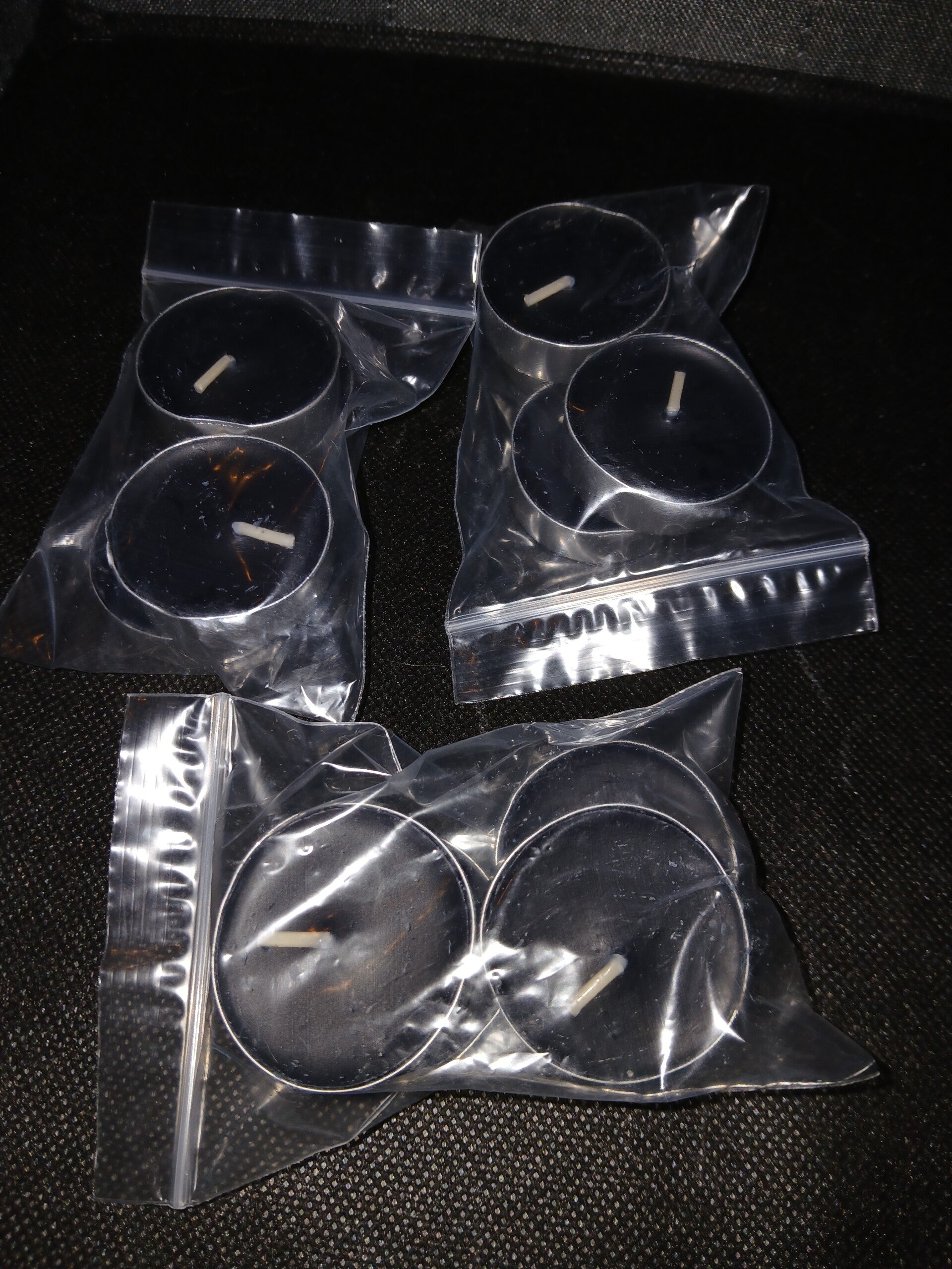 Black tealight candles