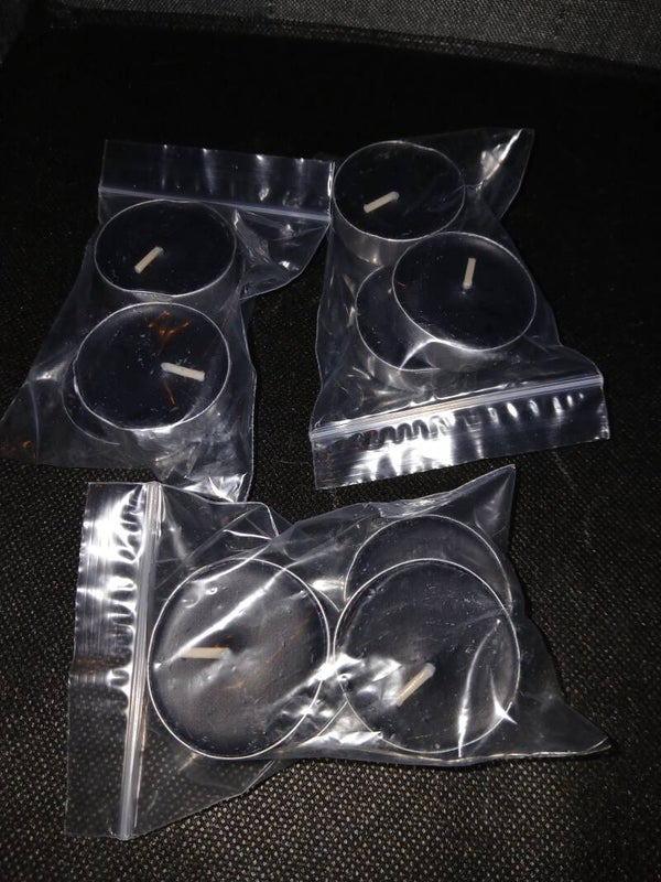 Black tealight candles
