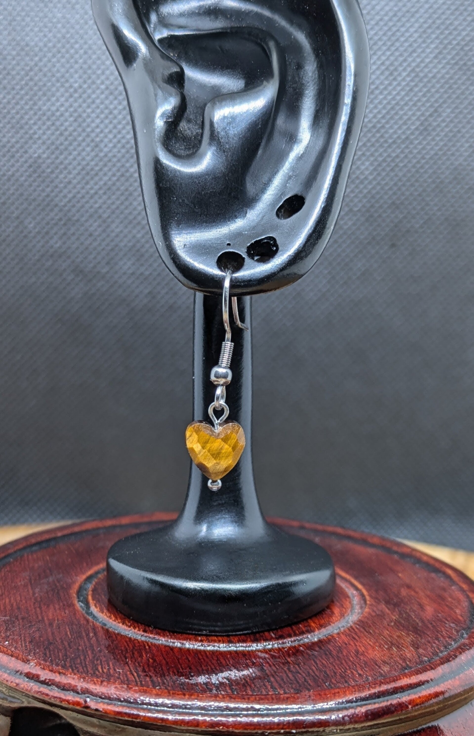 Faceted heart dangle earrings