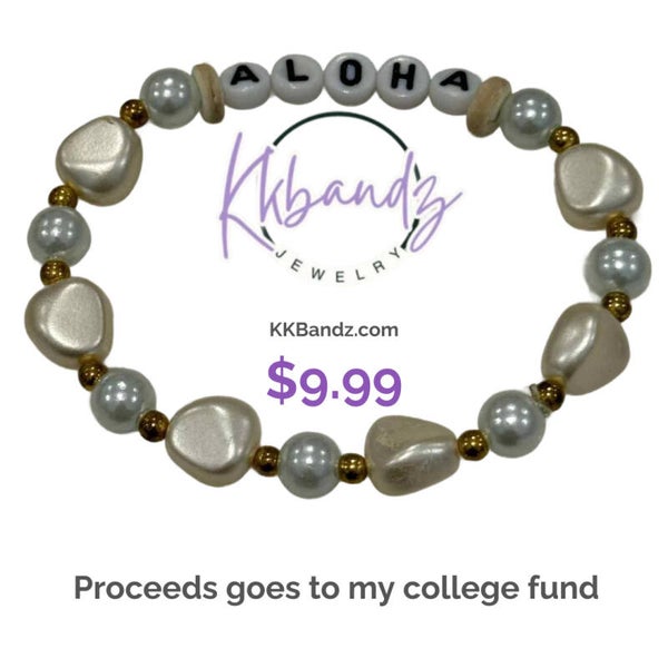 Aloha: With Gold Rock like beads, White Pearls and some Small  Gold Pearl beads.