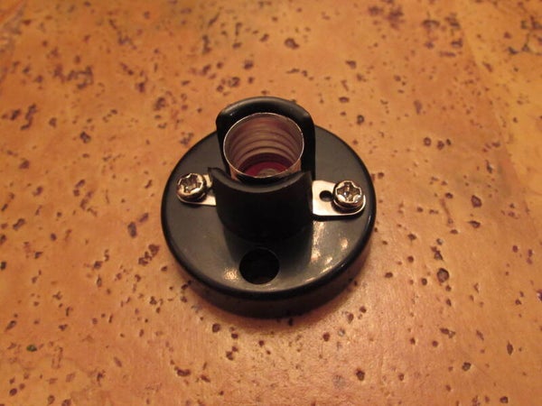 Fitting E10, met voet, zwart