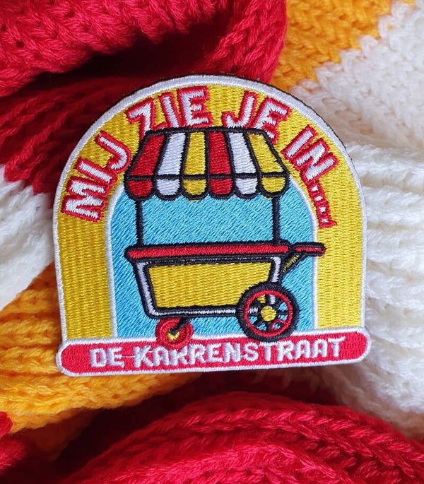 Embleem Mij zie je in De Karrenstraat DB042