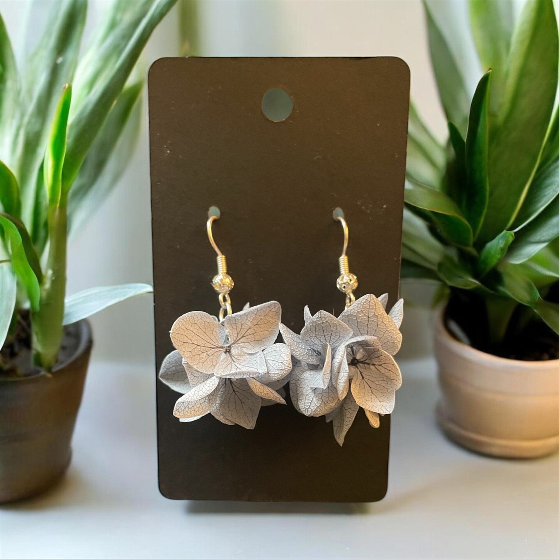 Boucles d'oreilles Pompon Gris