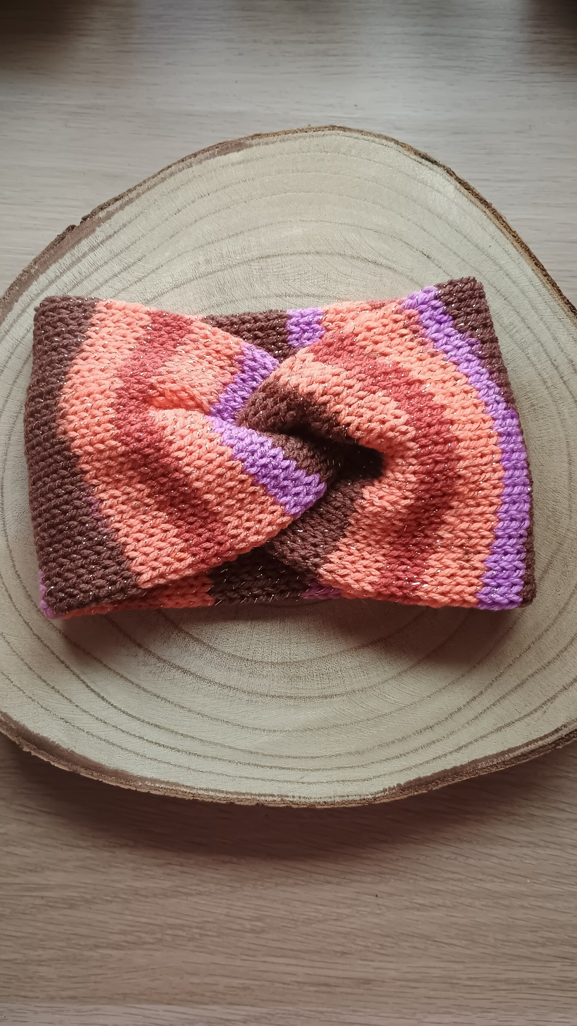 oorverwarmer oranje/paars/bruin gestreept met gouden glitter