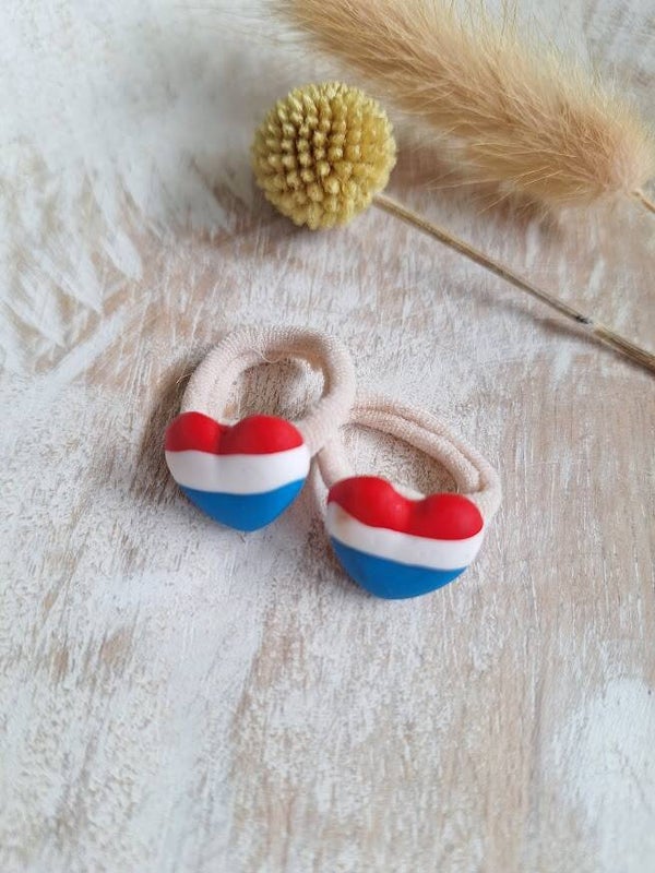 Elastiekje rood/wit/blauw (1st)