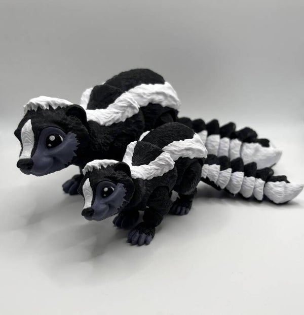 Volwassen en Jonge Stinkdier (Skunk)