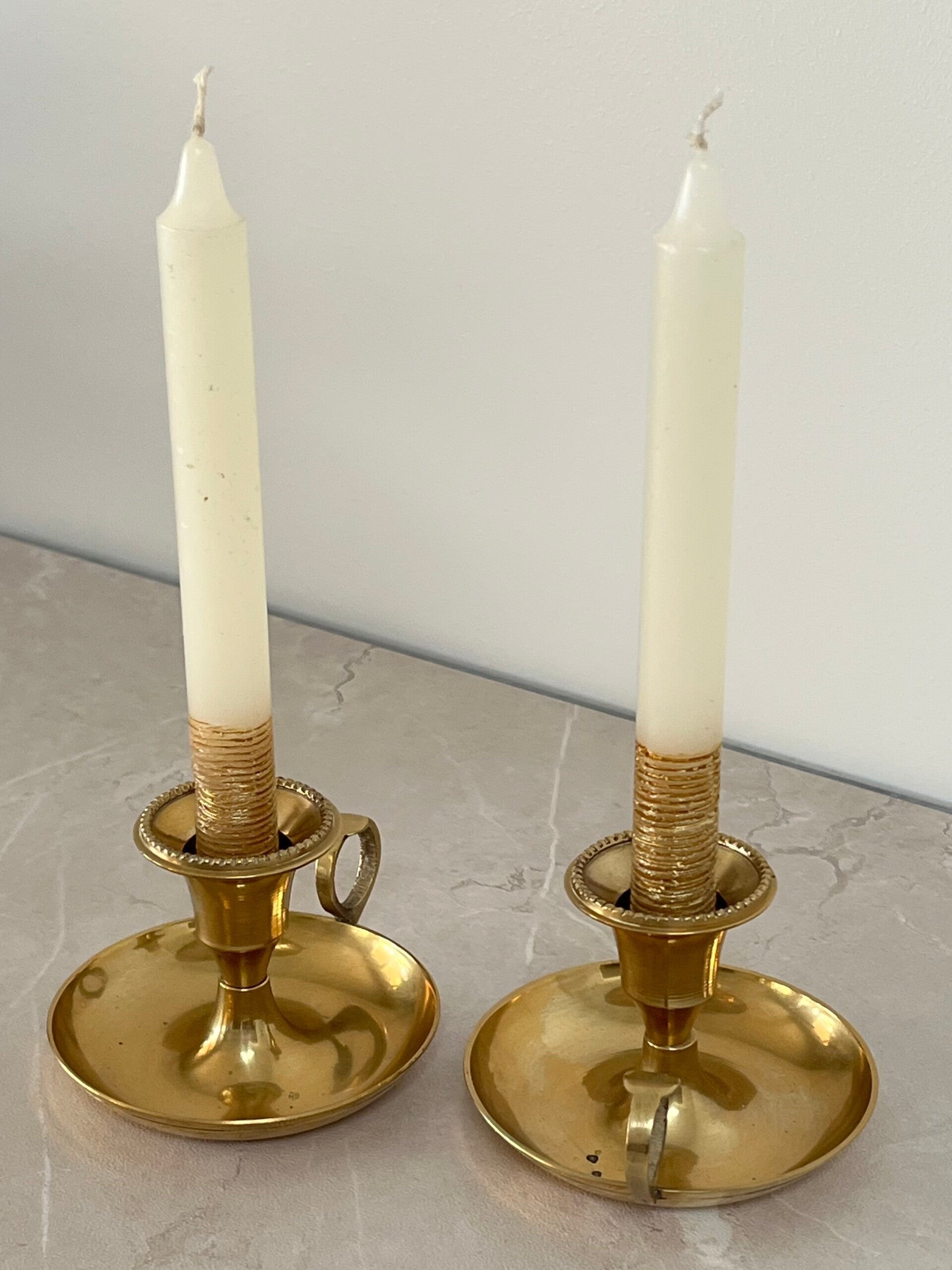 Bougeoirs pouciers en laiton