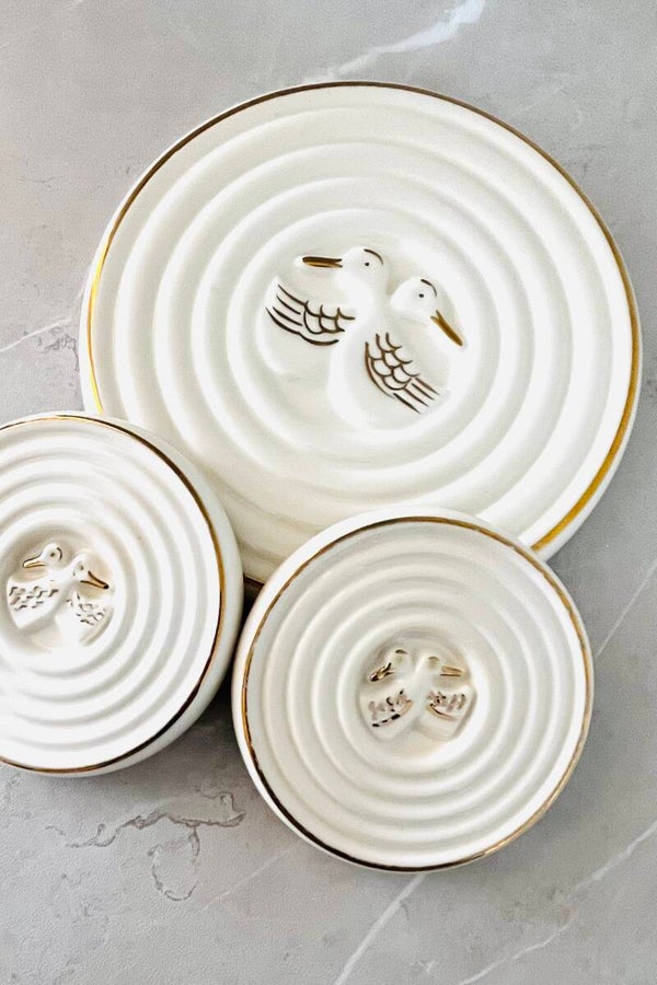 Ensemble dessous de plat et bouteilles Art Déco