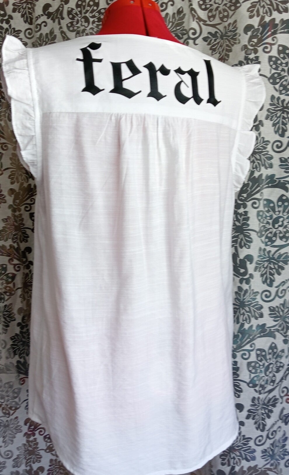 "feral" top