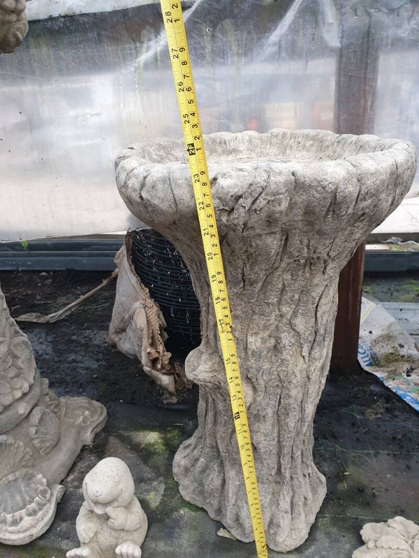 tree stump bird bath