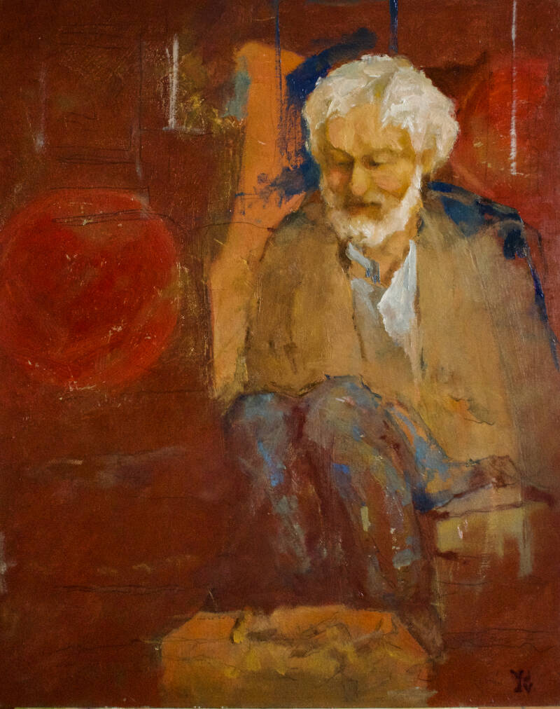 man zit in atelier te peinzen. Matthijs Röling