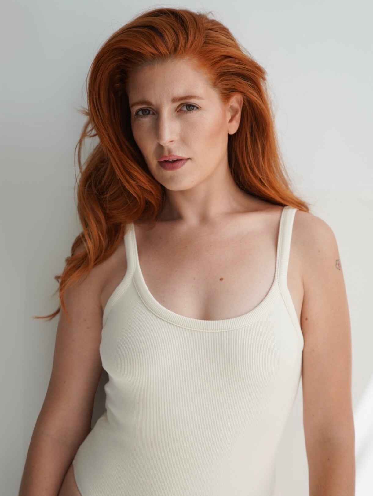 model and actress phia le roux dressed in white
