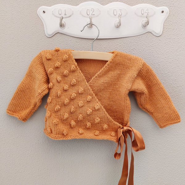 Baby overslagvestje Oker