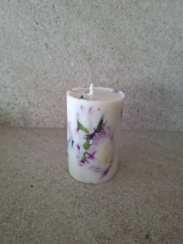 Vela con flores
