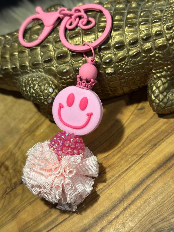 Smiley pompom sleutelhanger