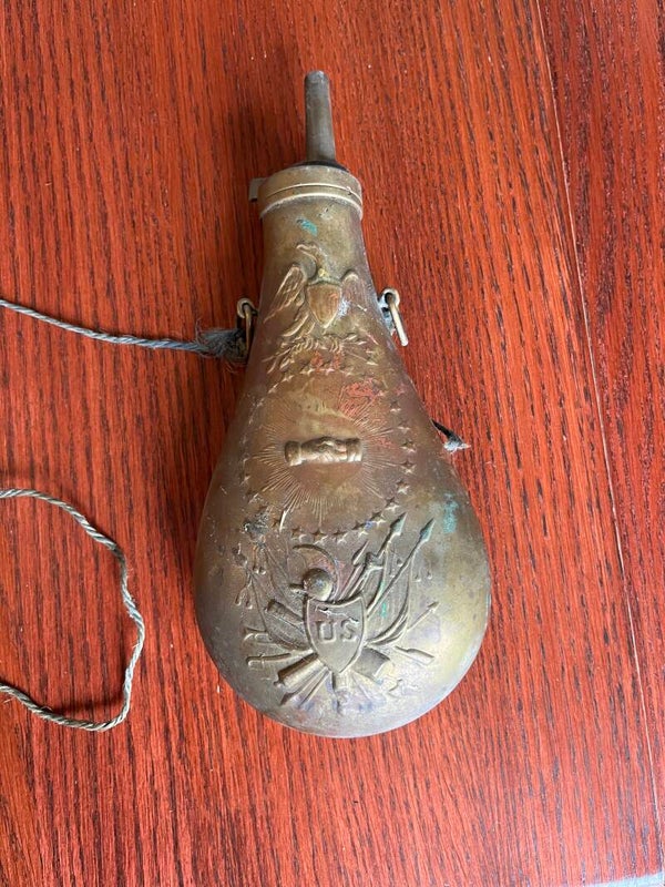 Brass embossed powder horn