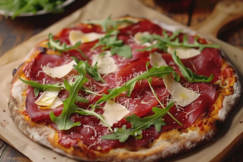 leontien-_a_photo_for_a_blogpost_showcasing_a_freshly_baked_piz_9121d722-eb27-4807-8678-97388c96e0c1-standard-jcskra.jpg