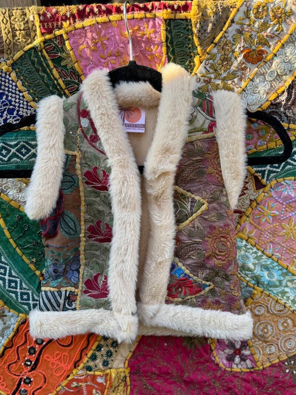 Kinder Zola waistcoat...