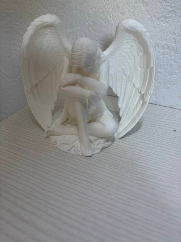 Zittende engel