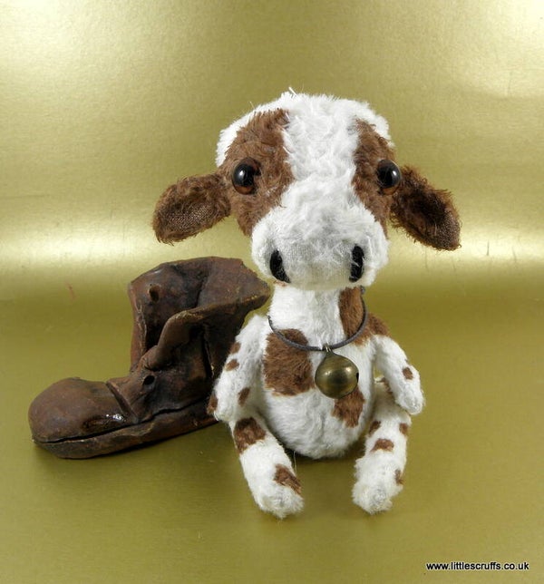 Clarabelle, a brown and white cow    NEW