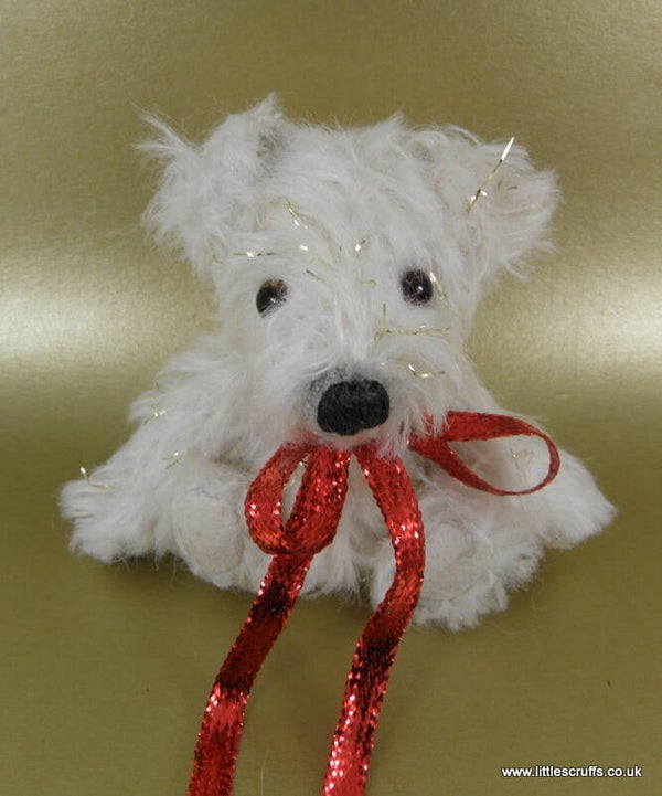 Sparky, a white mohair dog with threads of gold through him