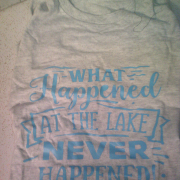 Apparel T-Shirt " What happens at the lake"