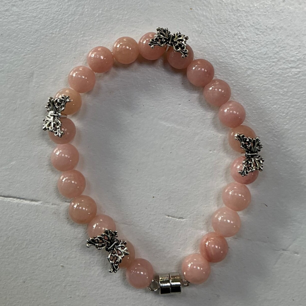 Armband roze vlinder